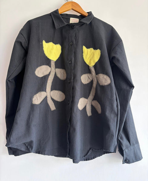 Black appliqué shirt